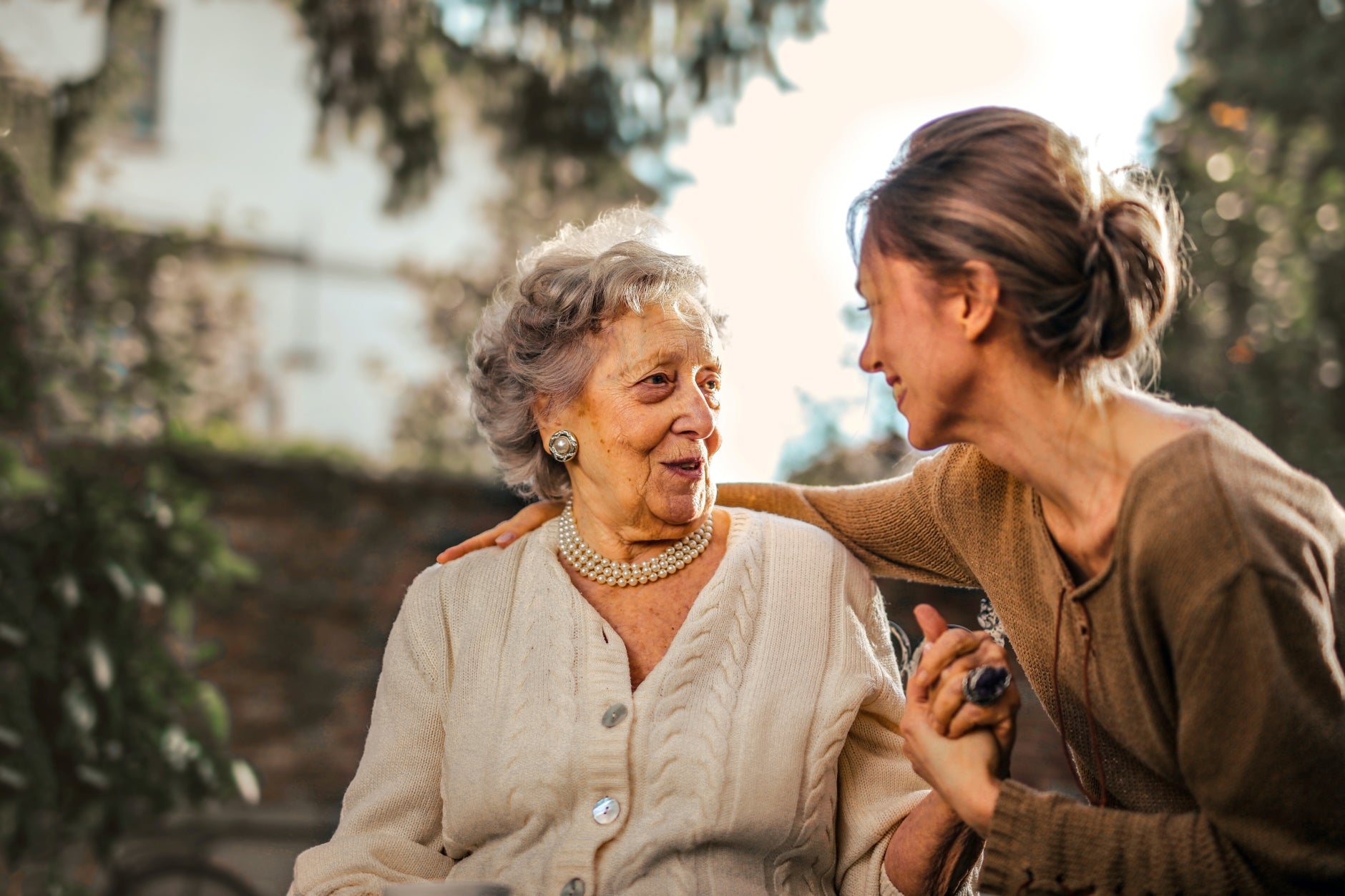 AbleUplift Compassionate picture of care giver with elders